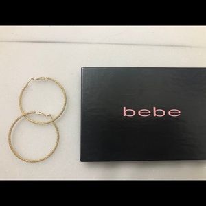 Bebe gold sparkle hoop earrings